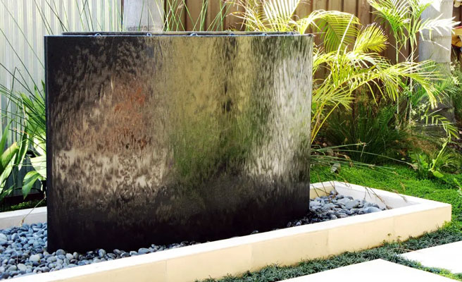 How to Install a Wall Water Feature in Your Garden